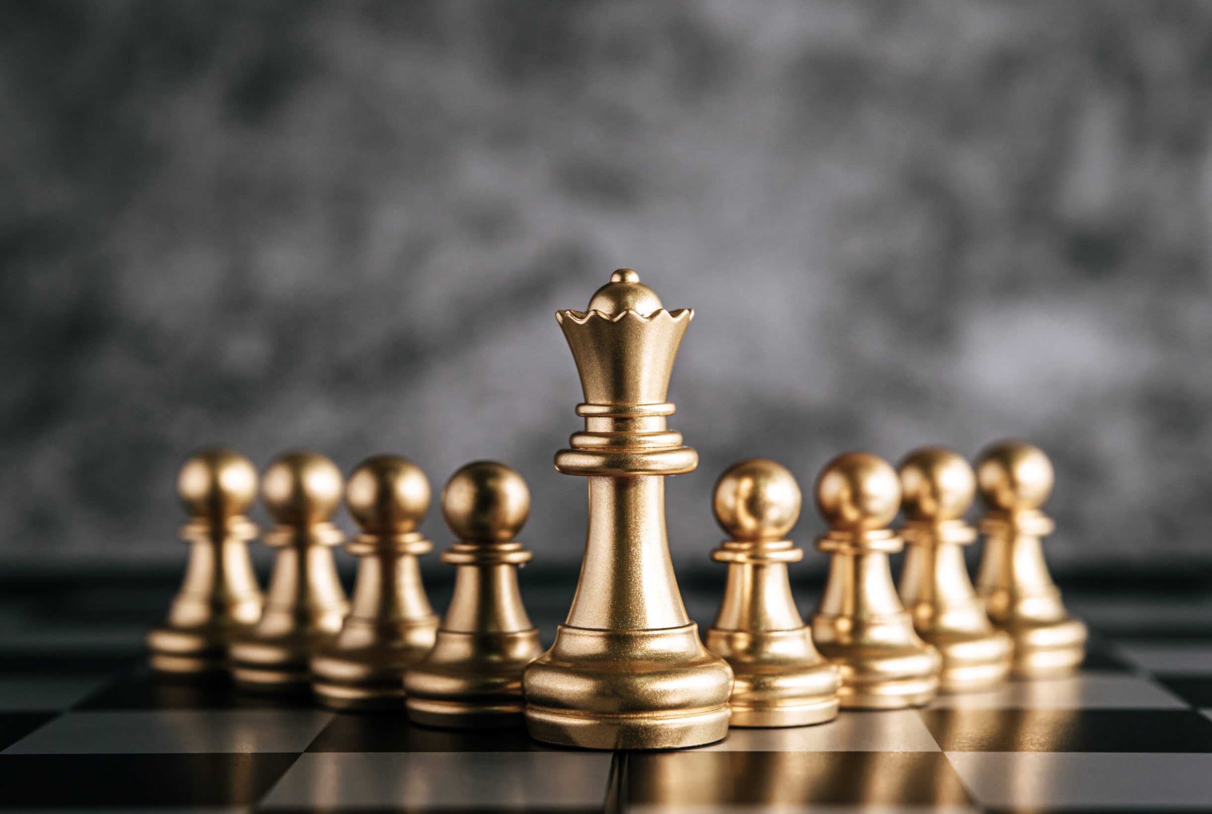 Gold Chess on chess board game for business metaphor leadership concept